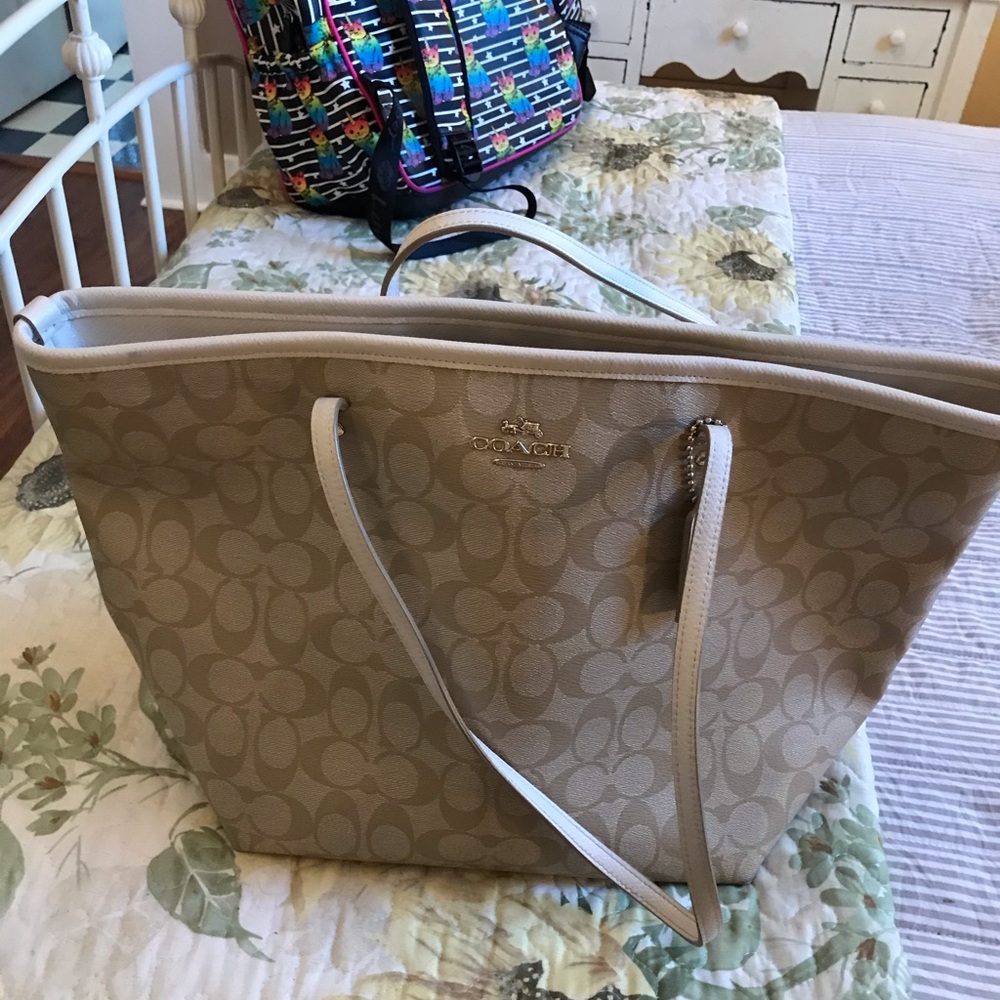 Tan coach signature tote purse